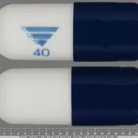 Zegerid (Omeprazole and sodium bicarbonate [ oh-me-pray-zol-and-so-dee-um-by-kar-bon-ate ])-Logo 40-40 mg / 1100 mg-Blue & White-Capsule-shape