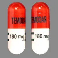 Temodar (Temozolomide)-TEMODAR 180 mg Logo-Temozolomide 180 mg-Orange & White-Capsule-shape