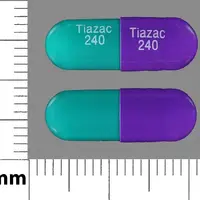 Tiazac (Diltiazem [ dil-tye-a-zem ])-Tiazac 240 Tiazac 240-240 mg-Green & Purple-Capsule-shape