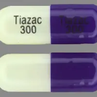 Tiazac (Diltiazem [ dil-tye-a-zem ])-Tiazac 300 Tiazac 300-300 mg-Purple / White-Capsule-shape