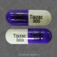 Tiazac (Diltiazem [ dil-tye-a-zem ])-Tiazac 300 Tiazac 300-300 mg-Purple / White-Capsule-shape