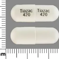 Tiazac (Diltiazem [ dil-tye-a-zem ])-Tiazac 420 Tiazac 420-420 mg-White-Capsule-shape