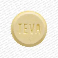 Levodopa/carbidopa (monograph) (Medically reviewed)-TEVA 93 293-25 mg / 100 mg-Yellow-Round