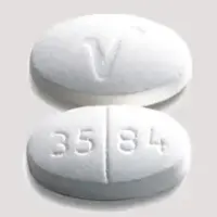 Ibudone (Hydrocodone and ibuprofen [ hye-dro-koe-done-and-eye-bue-pro-fen ])-3584 V-5 mg / 200 mg-White-Oval