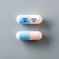 Ongentys (Opicapone [ oh-pik-a-pone ])-OPC 25 OPC 25-25 mg-Blue & Pink-Capsule-shape