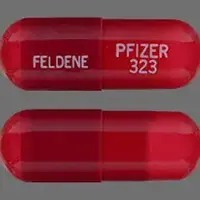 Feldene (Piroxicam [ peer-ox-i-kam ])-FELDENE PFIZER323-20 mg-Red-Capsule-shape