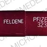 Feldene (Piroxicam [ peer-ox-i-kam ])-FELDENE PFIZER323-20 mg-Red-Capsule-shape