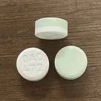 Norgesic (Aspirin/caffeine/orphenadrine [ as-pir-in/caf-feen/ore-fen-ah-drin ])-OAC 472-aspirin 385 mg / caffeine 30 mg / orphenadrine citrate 25 mg-Green & White-Round