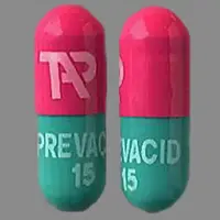 Prevacid (Lansoprazole [ lan-soe-pra-zol ])-TAP PREVACID 15-15 mg-Pink / Green-Capsule-shape