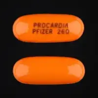 Procardia (Nifedipine [ nye-fed-i-peen ])-PROCARDIA PFIZER 260-10 mg-Orange-Capsule-shape