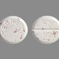 Tegretol (Carbamazepine (oral) [ kar-ba-maz-e-peen ])-TEGRETOL 52 52-100 mg-Pink & Red Specks-Round