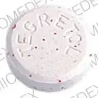 Tegretol (Carbamazepine (oral) [ kar-ba-maz-e-peen ])-TEGRETOL 52 52-100 mg-Pink & Red Specks-Round