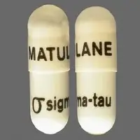 Matulane (Procarbazine [ pro-car-ba-zeen ])-MATULANE Logo sigma-tau-50 mg-White-Capsule-shape