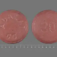 Adalat cc (Nifedipine [ nye-fed-i-peen ])-ADALAT CC 30-30 mg-Pink-Round