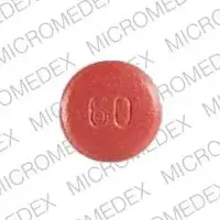 Adalat cc (Nifedipine [ nye-fed-i-peen ])-ADALAT CC 60-60 mg-Pink-Round