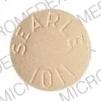 Aldactazide (Hydrochlorothiazide and spironolactone [ hye-dro-klor-oh-thy-a-zide-and-spir-on-oh-lak-tone ])-ALDACTAZIDE 25 SEARLE 1011-25 mg / 25 mg-Tan-Round