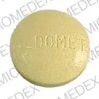 Aldomet (Methyldopa [ meth-il-doe-pa ])-ALDOMET MSD 401-250 MG-Yellow-Round