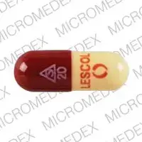 Lescol (Fluvastatin [ floo-va-sta-tin ])-S 20 LESCOL-20 mg-Red & Yellow-Capsule-shape