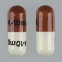 Soriatane (Acitretin [ a-si-tre-tin ])-A-10 mg A-10 mg-10 mg-Brown & White-Capsule-shape