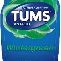 Tums e-x (Calcium carbonate [ kal-see-um-kar-boe-nate ])-TUMS-calcium carbonate 750 mg-Green-Round