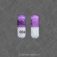 Nitroglycerin (topical) (Nitroglycerin (topical) [ nye-troe-glis-er-in ])-ETHEX 004-2.5 mg-Purple / Clear-Capsule-shape