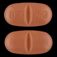 Oxcarbazepine (Oxcarbazepine [ ox-kar-bay-zeh-peen ])-B2 92-150 mg-Beige-Oval