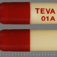 Aspirin and dipyridamole (Aspirin and dipyridamole [ as-pi-rin-and-dye-peer-id-a-mole ])-TEVA 01A-25 mg / 200 mg-Red & White-Capsule-shape