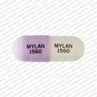 Phenytoin (Phenytoin (oral) [ fen-i-toyn ])-MYLAN 1560 MYLAN 1560-100 mg-Purple / White-Capsule-shape