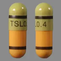 Tamsulosin (Tamsulosin [ tam-soo-loe-sin ])-TSL 0.4-0.4 mg-Green & Orange-Capsule-shape