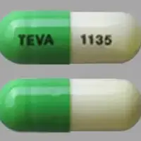 Acitretin (Acitretin [ a-si-tre-tin ])-TEVA 1135-10 mg-Green & White-Capsule-shape