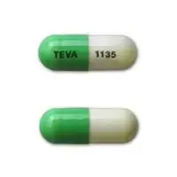 Acitretin (Acitretin [ a-si-tre-tin ])-TEVA 1135-10 mg-Green & White-Capsule-shape