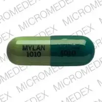 Piroxicam (Piroxicam [ peer-ox-i-kam ])-MYLAN 1010 MYLAN 1010-10 mg-Dark & Light Green-Capsule-shape