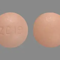 Ribavirin (Ribavirin (oral) [ rye-ba-vye-rin ])-ZC 19-200 mg-Pink-Round