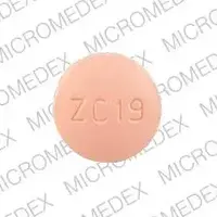 Ribavirin (Ribavirin (oral) [ rye-ba-vye-rin ])-ZC 19-200 mg-Pink-Round