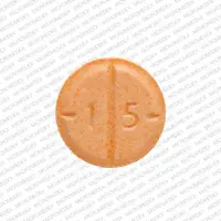 Amphetamine sulfate (Amphetamine [ am-fet-a-meen ])-b 777 1 5-15 mg-Orange-Round