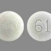 Atropine and diphenoxylate (Atropine and diphenoxylate [ a-troe-peen-and-dye-fen-ox-i-late ])-SEARLE 61-0.025 mg / 2.5 mg-White-Round