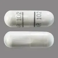 Quinine (Quinine [ kwye-nine ])-AR 102 AR 102-324 mg-White-Capsule-shape