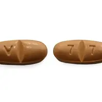 Oxcarbazepine (Oxcarbazepine [ ox-kar-bay-zeh-peen ])-V 7 7-300 mg-Brown-Oval