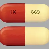 Acitretin (Acitretin [ a-si-tre-tin ])-IX 669-25 mg-Brown & Yellow-Capsule-shape