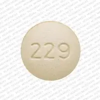 Oxymorphone (Oxymorphone [ ox-ee-mor-fone ])-Logo (Actavis) 229-20 mg-Tan-Round