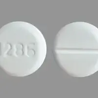 First baclofen (Baclofen (oral) [ bak-loe-fen ])-1286-20 mg-White-Round