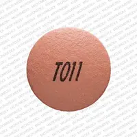 Nifedipine (Nifedipine [ nye-fed-i-peen ])-T011-30 mg-Pink-Round