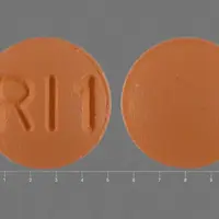 Risperidone (Risperidone (oral) [ ris-per-i-done ])-RI1-0.25 mg-Orange-Round