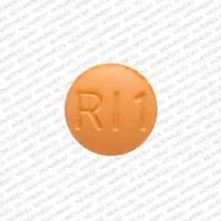 Risperidone (Risperidone (oral) [ ris-per-i-done ])-RI1-0.25 mg-Orange-Round