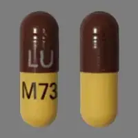 Doxycycline (Doxycycline [ dox-i-sye-kleen ])-LU M73-100 mg-Brown & Yellow-Capsule-shape