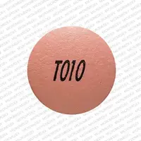 Nifedipine (eqv-adalat cc) (Nifedipine [ nye-fed-i-peen ])-T010-60 mg-Pink-Round