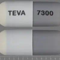 Minocycline (Minocycline [ mye-no-sye-kleen ])-TEVA 7300-75 mg-Gray & White-Capsule-shape