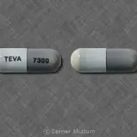 Minocycline (eent) (monograph) (Medically reviewed)-TEVA 7300-75 mg-Gray & White-Capsule-shape
