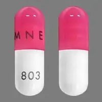 Temozolomide (oral/injection) (Temozolomide (oral/injection) [ tem-oh-zoe-loe-mide ])-AMNEAL 803-100 mg-Pink & White-Capsule-shape