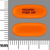 Nifedipine (eqv-procardia xl) (Nifedipine [ nye-fed-i-peen ])-PROCARDIA PFIZER 260-10 mg-Orange-Capsule-shape